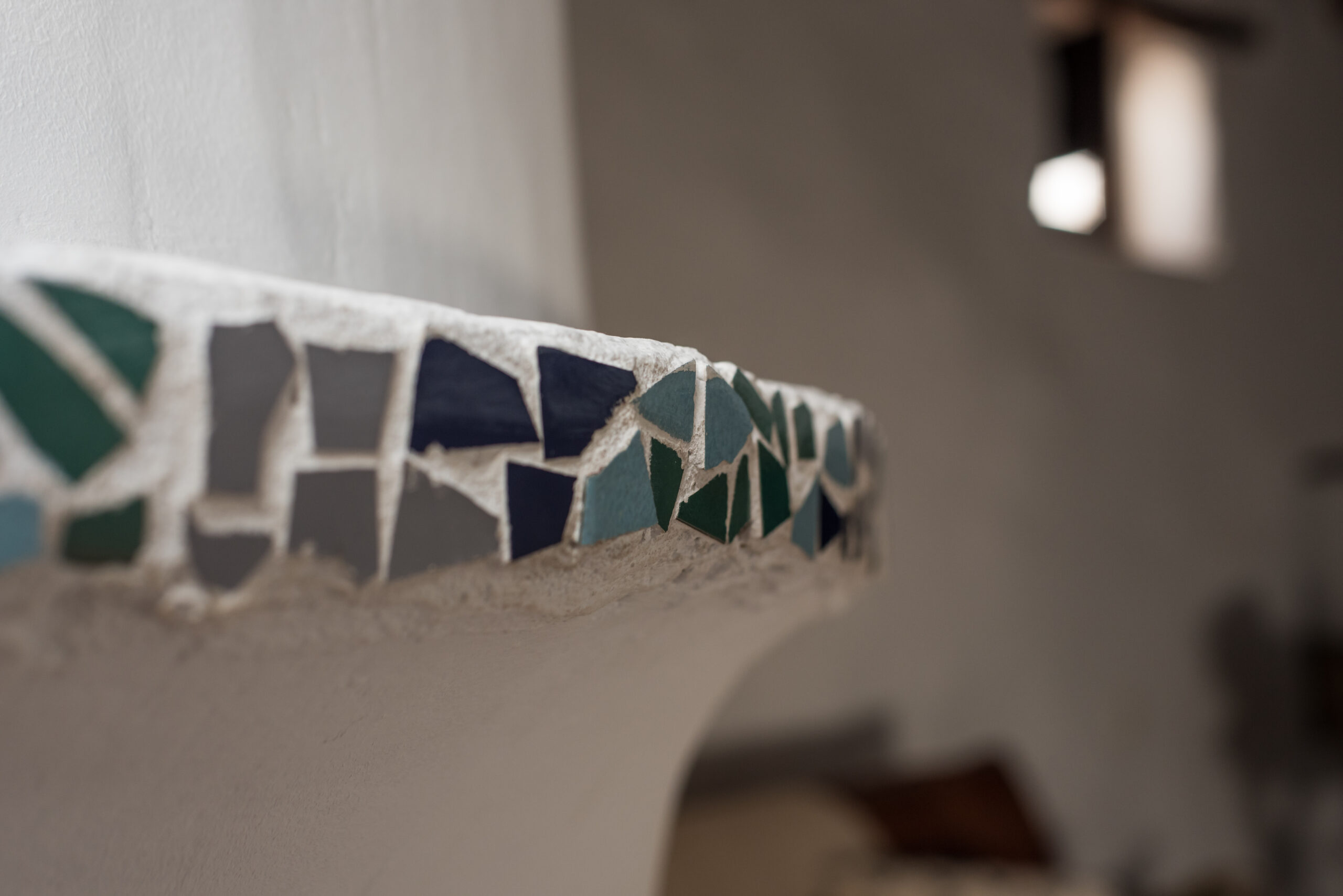 Mozaïk detail tussen keuken en woonkamer